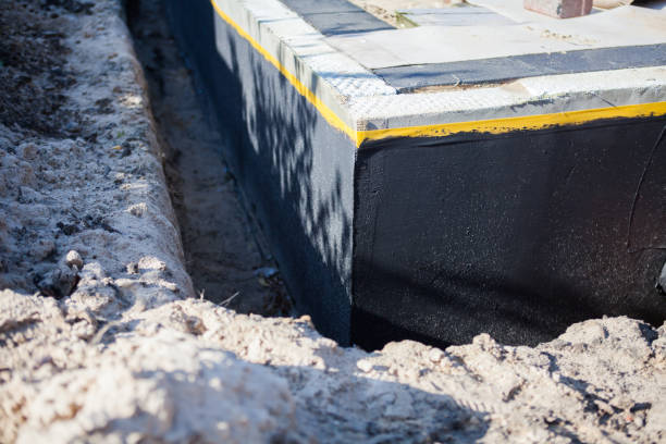 Professional Emergency Waterproofing technician working in Inwood, NY